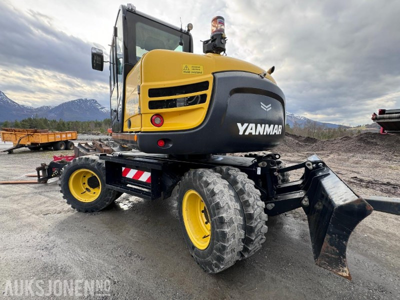 Escavadeira 2019 Yanmar B110W Hjulgraver - Firehjulsstyring - Sentralsmøring - Dumperhenger - Tiltrotator - Pusskuffe - Smalskuffe - Graveskuffe - Hydraulisk vibroplate - Pallegafler: foto 7